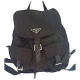 Prada brown synthetic backpacks