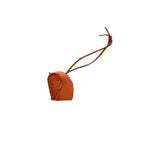 Hermès orange leather bag charms