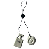 Chanel white ceramic bag charms