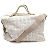 Chanel beige cloth travel bag