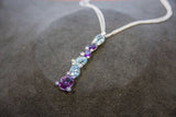 "Calla" style 18 kt white gold necklace, with azure oval cut topazes, oval cut amethysts and diamonds - by ITITOLI