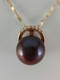 "Comete" women's necklace in 18 kt rosé gold with natural diamonds 0.04 ct tot.and dark pearl on the pendant. Weight: 5.5 g